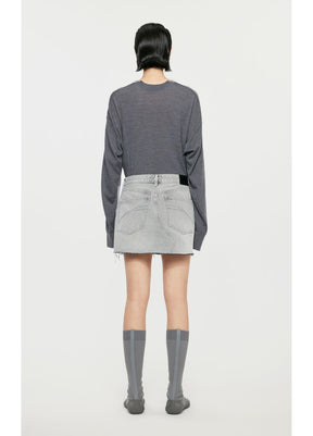 Back view of JNBY Denim Skirt showing pocket details and hemline